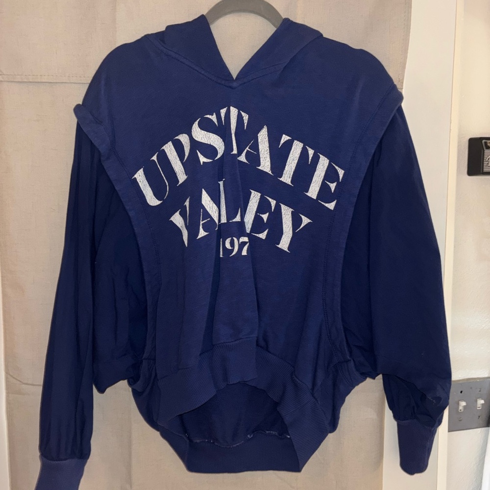 Fun unique hoodie. Thinner material, not sure how to describe it but it’s nice!